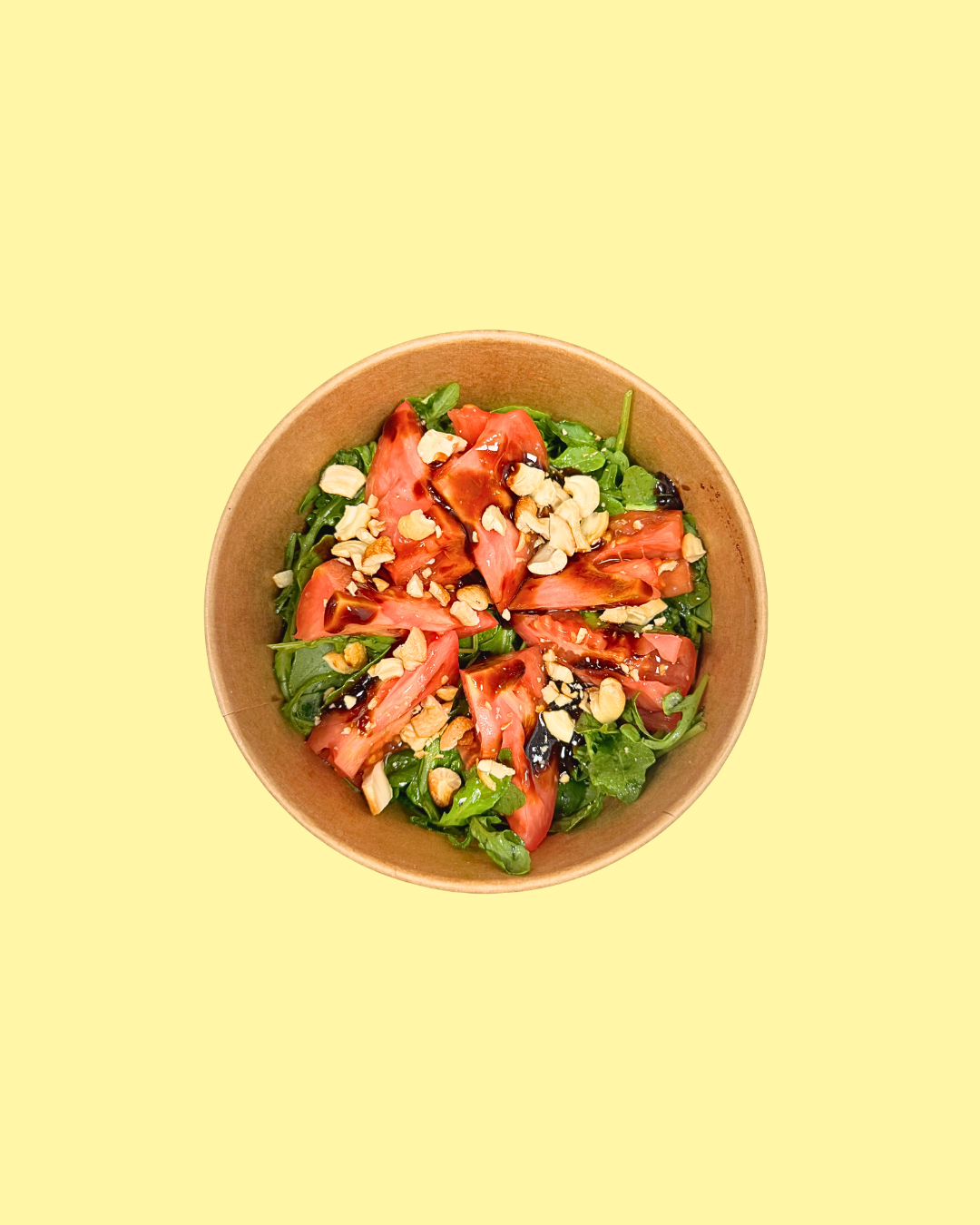 Ensalada de Tomates de temporada, Rúcula y Anacardos tostados